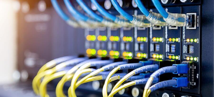 Wall-mounted Ethernet ports and cable termination in corporate office