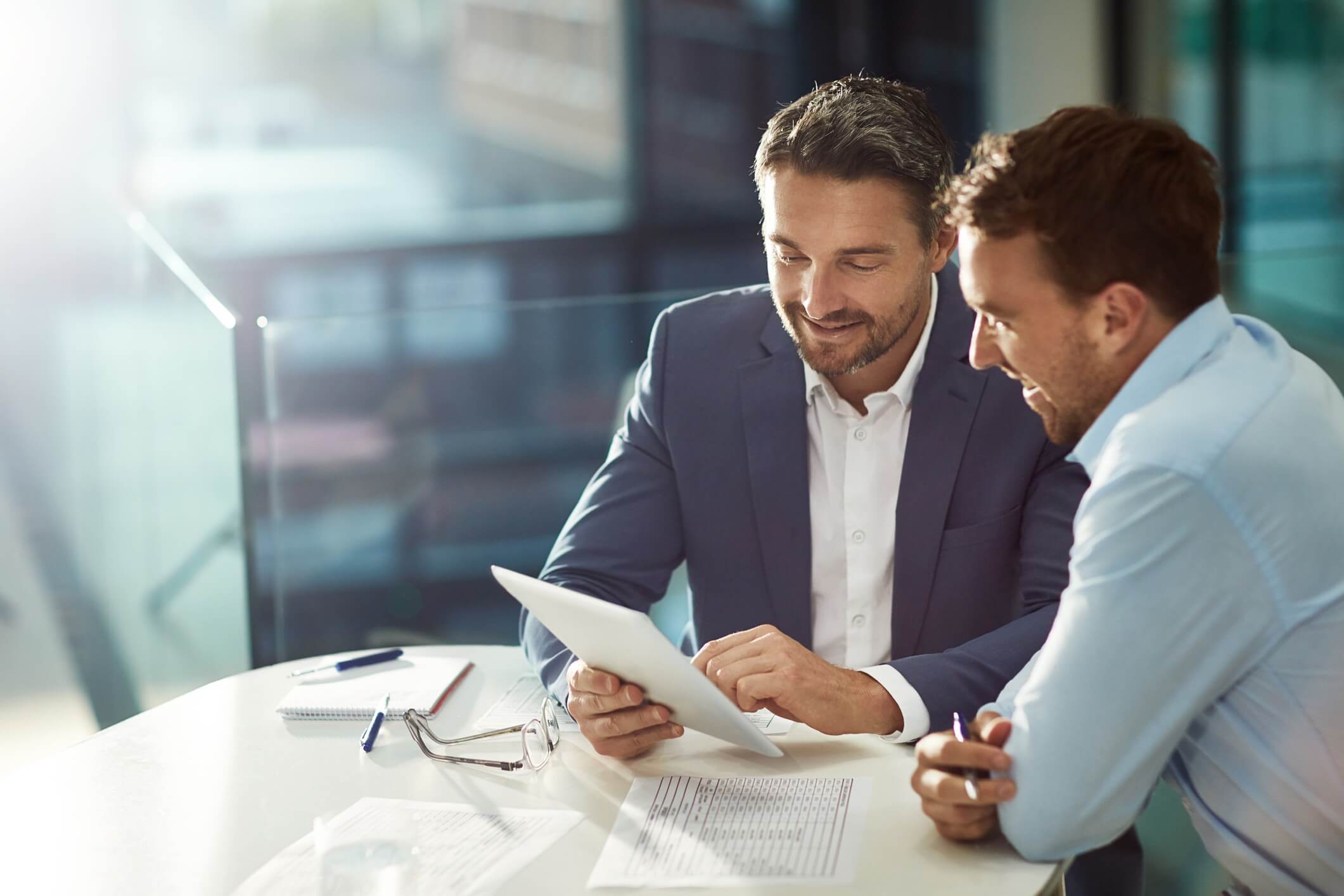 Consultant advising business decision-maker in Los Angeles on wireless performance.