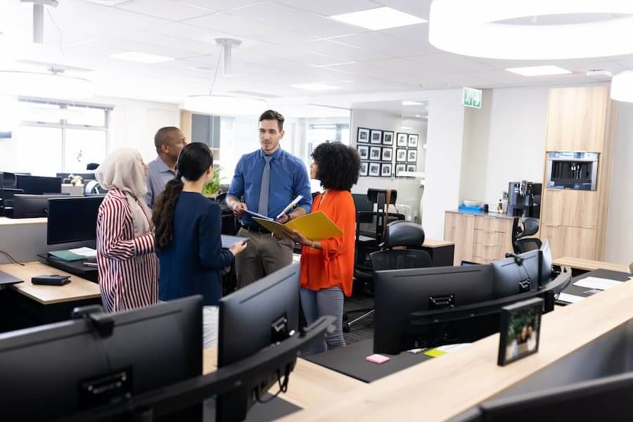 IT procurement specialists in Los Angeles reviewing enterprise hardware for Global IT clients.