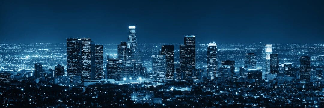 Los Angeles skyline with wireless infrastructure overlay.